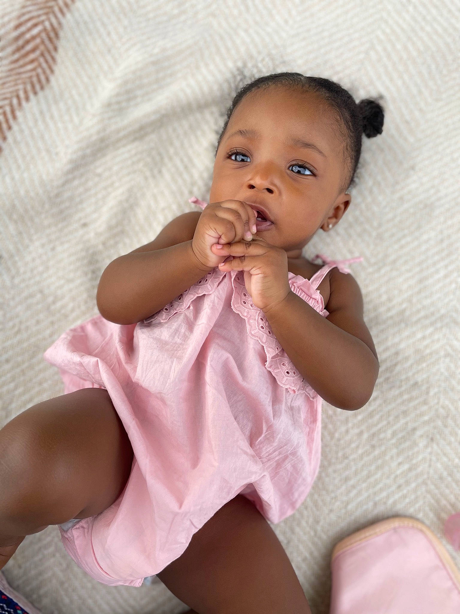 Sanaa is registered to the contest to win money with this photo: baby, baby_toddler_clothing, cheek, chin, dress, eye, eyelash, face, gesture, hair, happy, head, iris, lip, nose, person, pink, skin, sleeve, textile