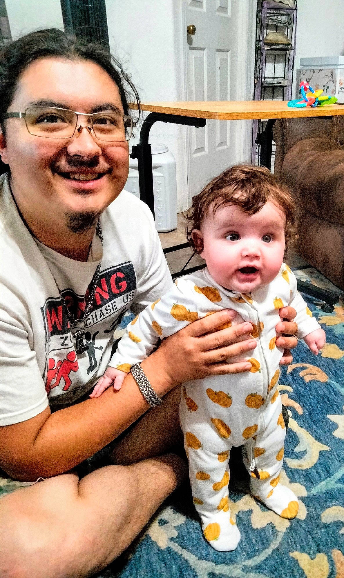 Kaylee is registered to the contest to win money with this photo: baby, baby_toddler_clothing, child, event, eyewear, face, facial_expression, fun, fur, glasses, hair, hairstyle, happy, head, joy, leisure, person, sitting, skin, smile