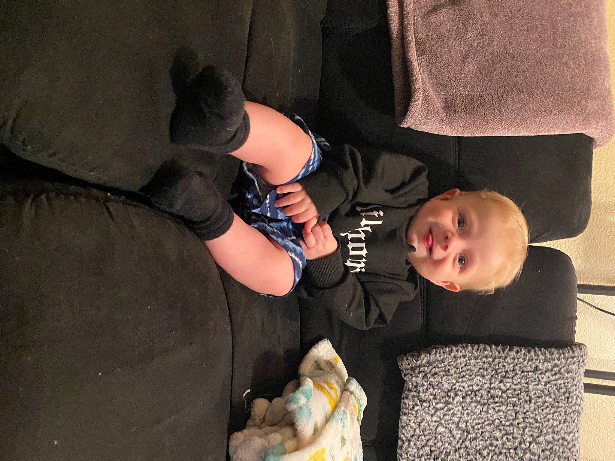 Brysen joined the competition — help win amazing prizes! baby, baby_products, baby_toddler_clothing, child, comfort, elbow, fun, hat, human_leg, knee, lap, leg, nail, person, plastic_bag, room, sitting, toddler