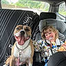 Jyna participe au concours pour gagner de l'argent avec cette photo : dog, child, car, car_interior, road_trip, smiling, happy, portrait, sitting, tongue_out, collar, leash, pacifier, blonde_hair, back_seat, child_seat, seat_cover, outdoors, trees, family