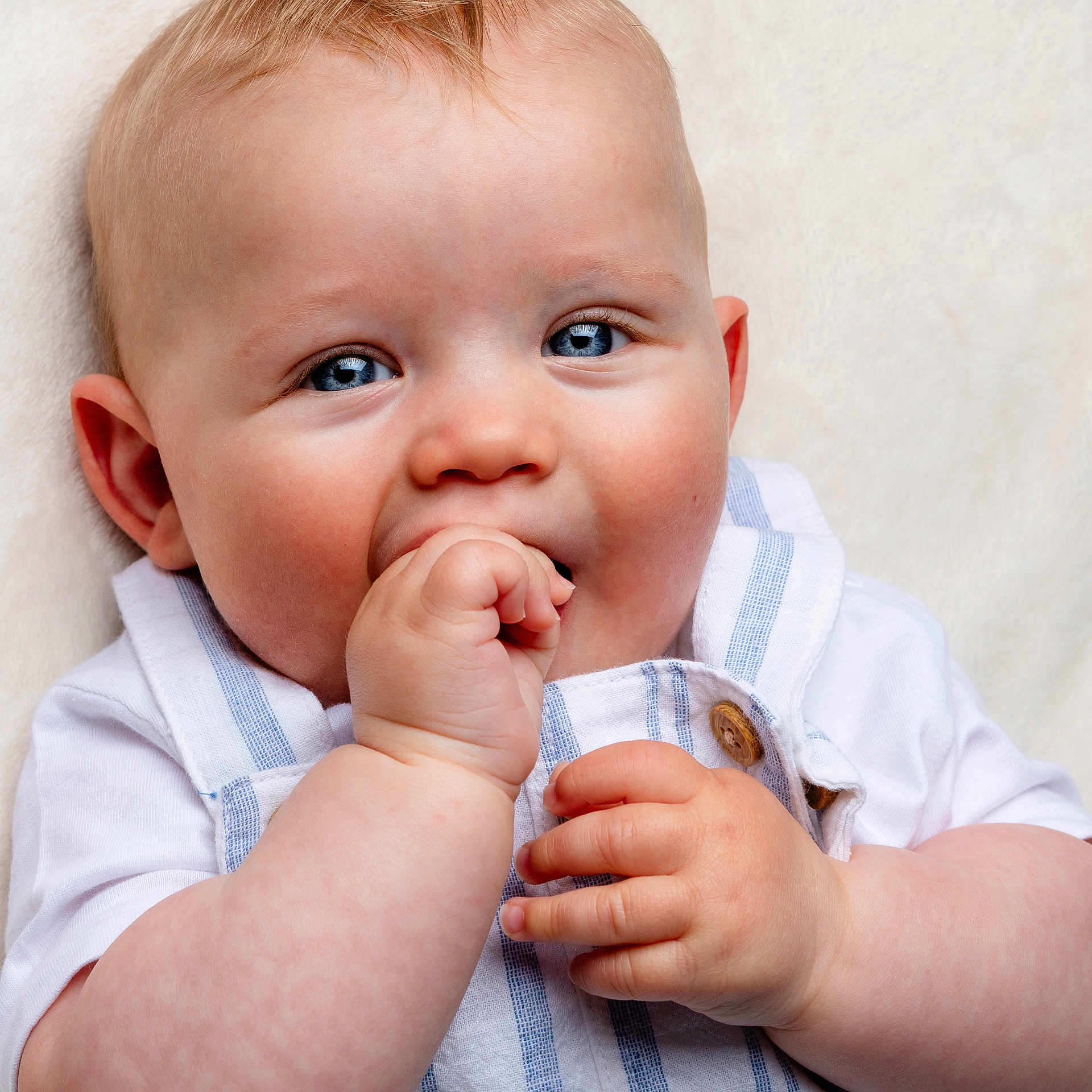 Brodie joined the competition — help win amazing prizes! arm, baby, biting, bodypart, eating, face, finger, food, hand, happy, head, newborn, person, photography, portrait, smile, toe, wrist