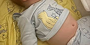 Josiah-Jay is registered to the contest to win money with this photo: baby, sleeping, pajamas, blanket, yellow, winnie_the_pooh, animal_print, infant, child, bedtime, soft, cute, peaceful, hand, face, clothing, toddler, nap, diaper, lying_down
