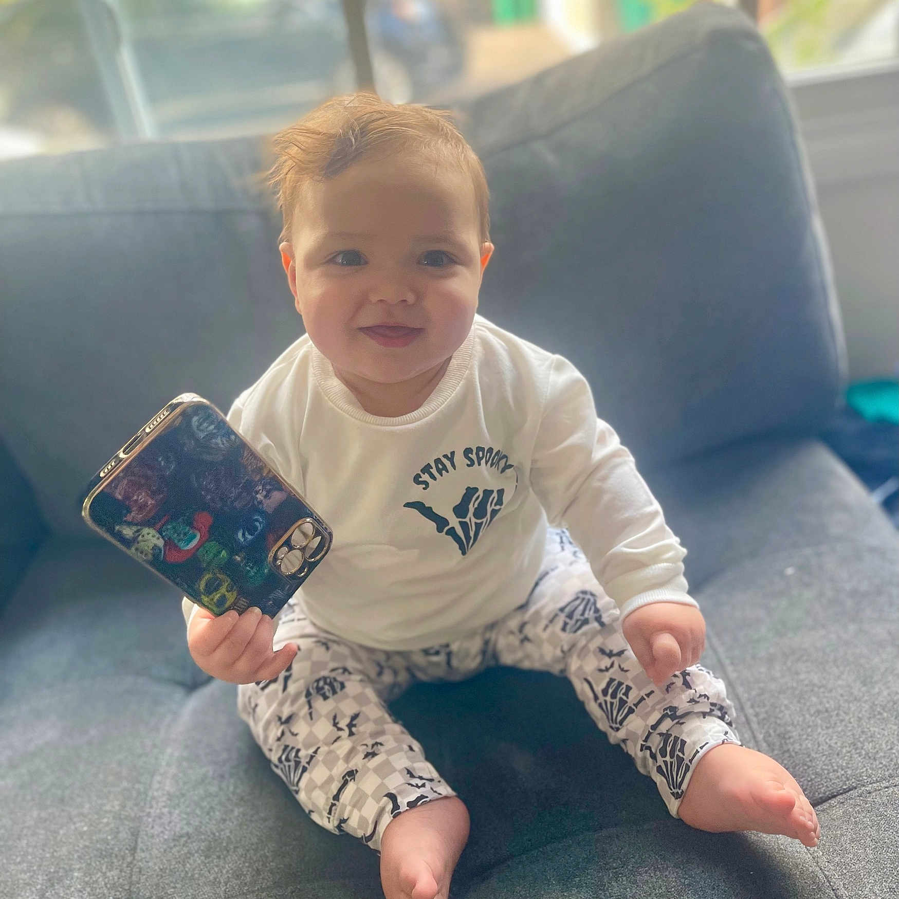 Rhaenyra is registered to the contest to win money with this photo: baby, babylaughing, blonde, bodypart, can, clothing, crawling, face, hair, happy, head, jeans, pants, person, photography, portrait, sitting, sleeve, smile, tin
