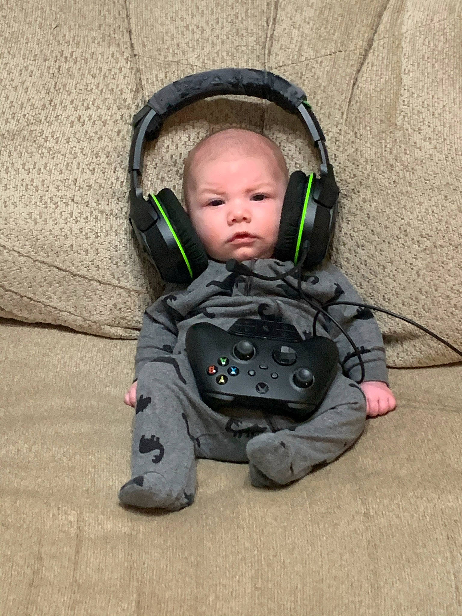 Ash joined the competition — help win amazing prizes! audio_equipment, baby, baby_carriage, baby_products, baby_safety, baby_toddler_clothing, cheek, child, comfort, face, flooring, fun, grass, hair, headphones, hearing, leg, person, personal_protective_equipment, sitting