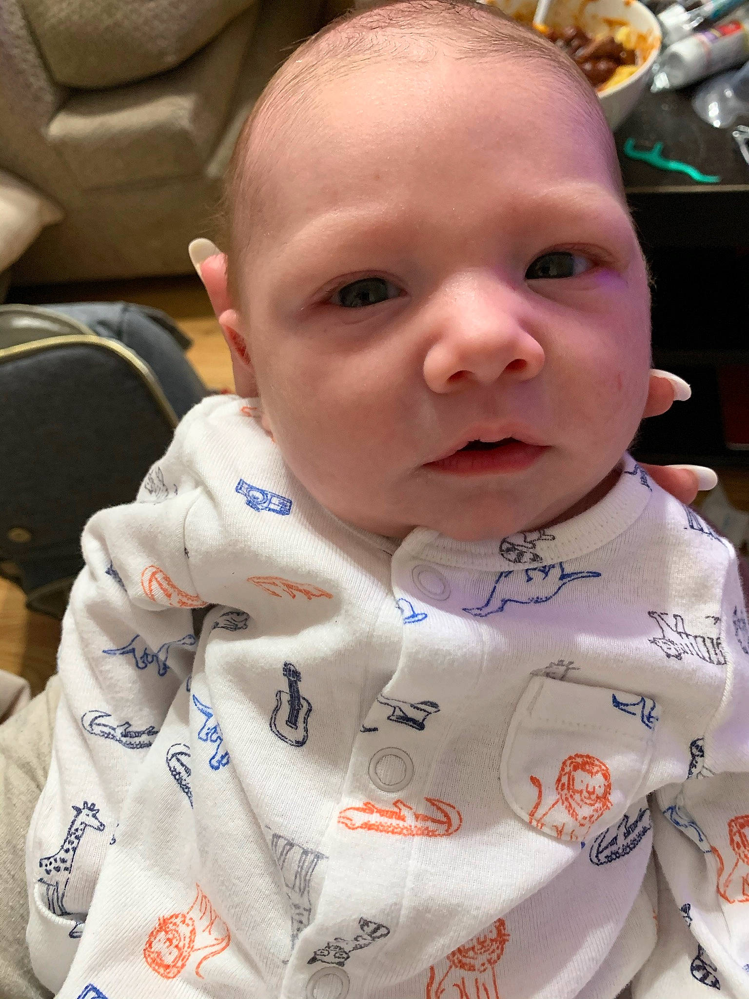 Ash is registered to the contest to win money with this photo: baby, baby_toddler_clothing, bib, cheek, child, chin, cool, eyebrow, eyelash, forehead, happy, human, lip, mouth, nose, outerwear, person, skin, sleeve, t_shirt