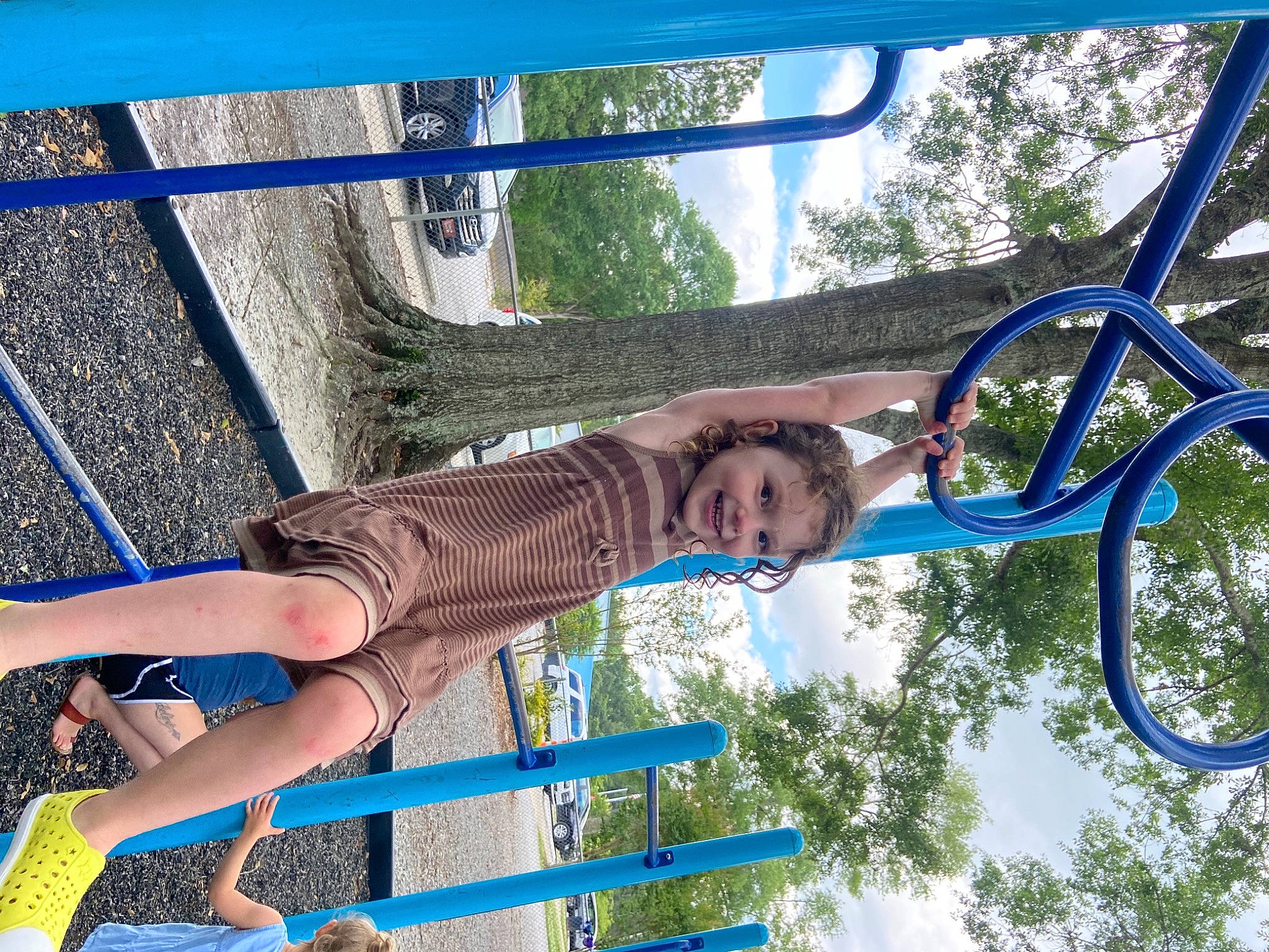 Kadence is registered to the contest to win money with this photo: azure, blue, cool, daytime, electric_blue, fun, joy, knee, leg, leisure, line, nature, people_in_nature, person, photograph, shorts, sky, summer, thigh, tree