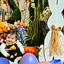 baby, child, easter, easter_eggs, flowers, plants, bunny_decoration, spring, colorful, cute, smiling, festive, holiday, portrait, indoors, decor, happy, sitting, person, seasonal