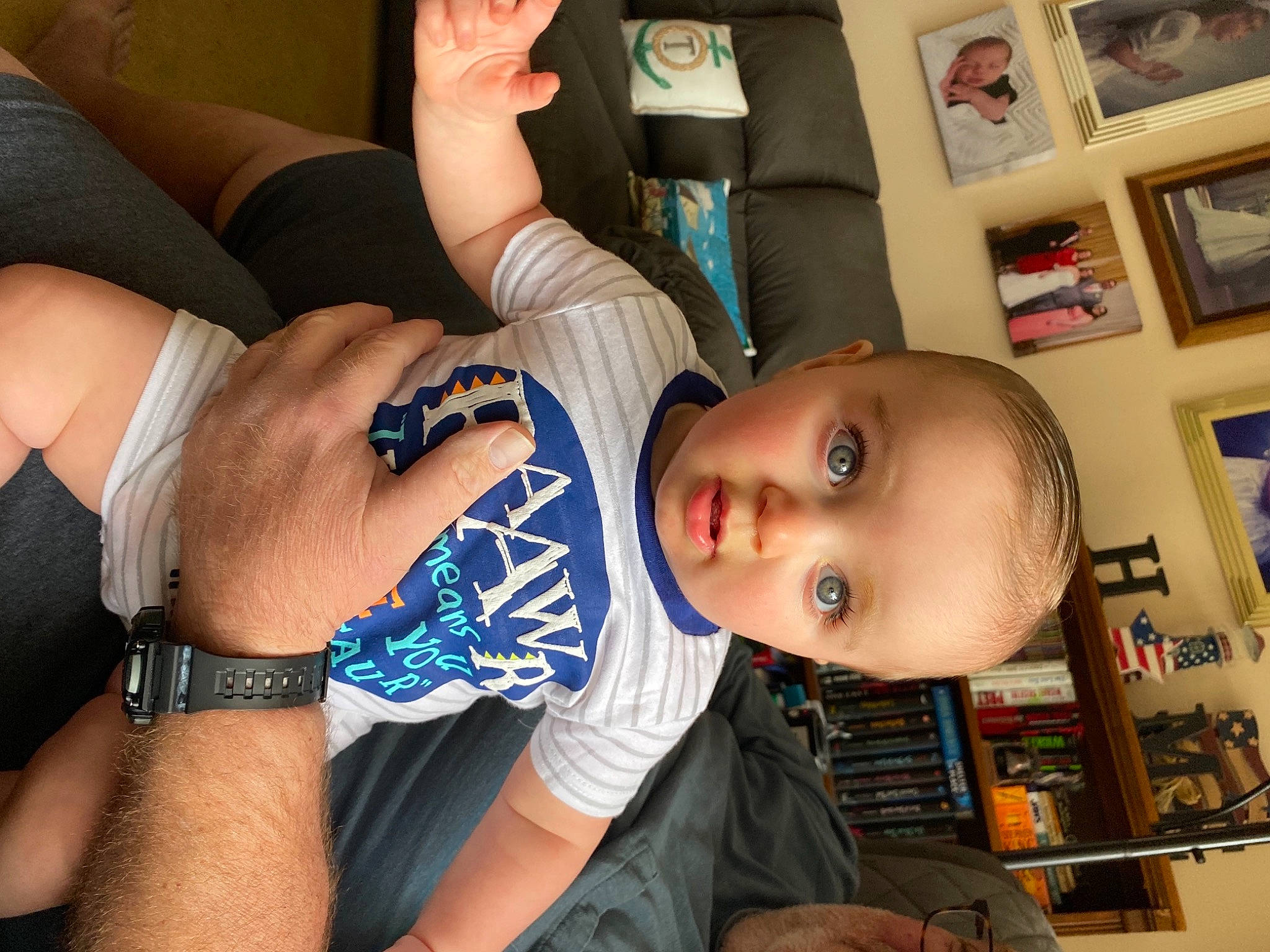 Dylan joined the competition — help win amazing prizes! arm, chest, comfort, cool, couch, elbow, gesture, hairstyle, hand, happy, human_body, joint, knee, mouth, neck, person, shelf, thigh, toddler, trunk