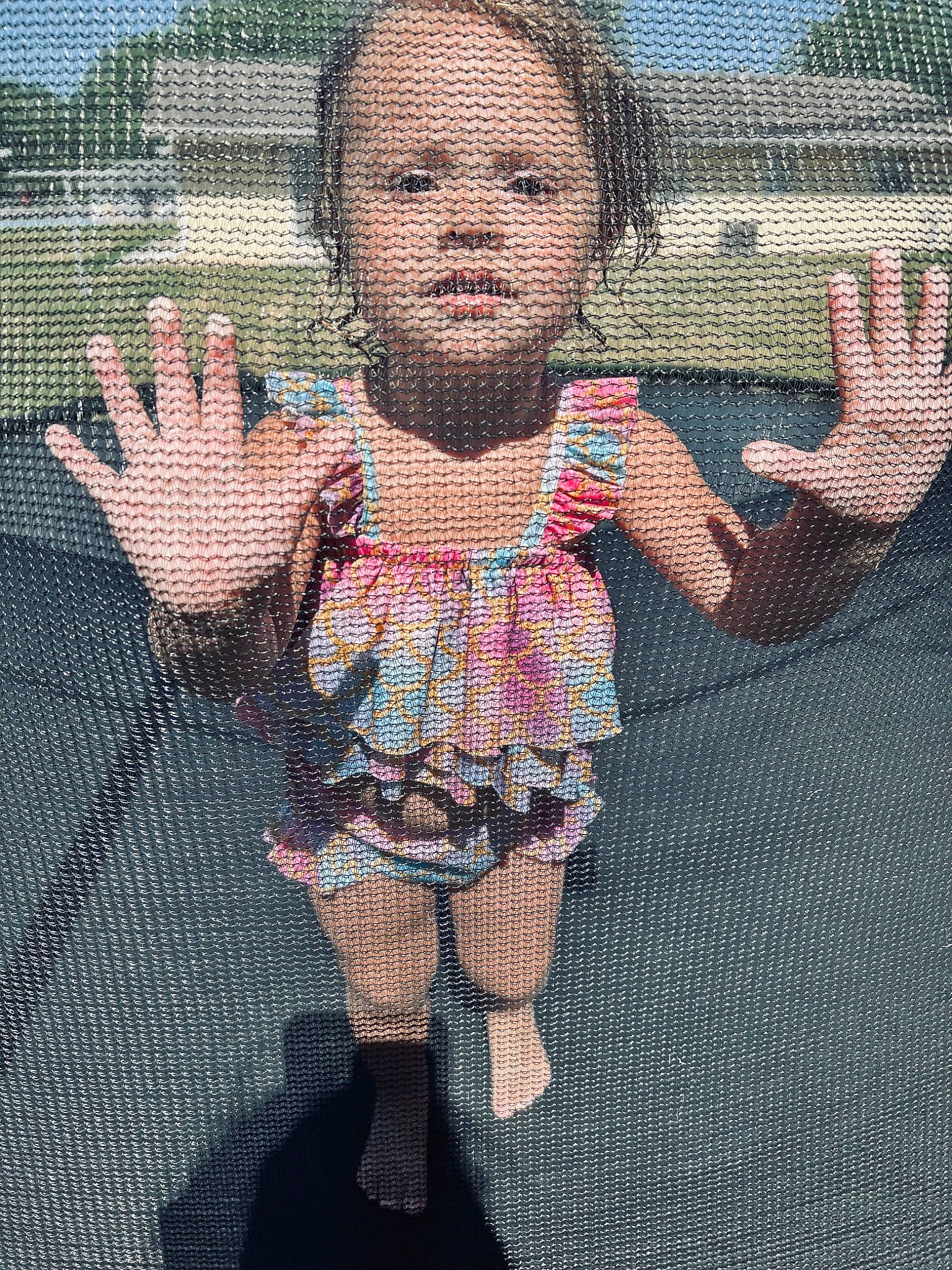 Tilly is registered to the contest to win money with this photo: arm, child, dress, finger, fun, hand, human_body, human_leg, leisure, magenta, mesh, pattern, person, pink, shorts, textile, thigh, thumb, toddler, tree