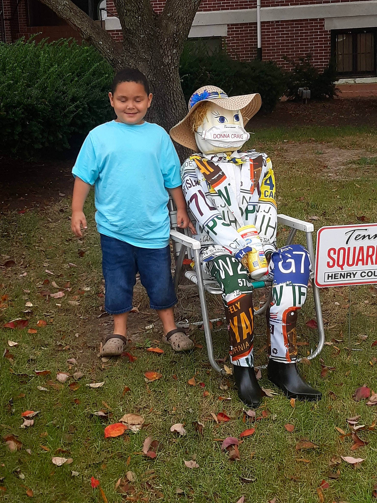 Avion joined the competition — help win amazing prizes! art, boot, carmine, event, fun, garden, grass, hat, joy, lawn_ornament, leaf, leisure, person, personal_protective_equipment, plant, recreation, scarecrow, shorts, smile, soil