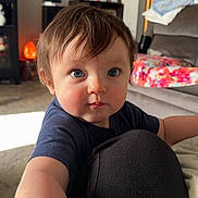 Asher joined the competition — help win amazing prizes! architecture, baby, bodypart, building, clothing, couch, face, finger, furniture, hand, head, indoors, interiordesign, livingroom, person, photography, portrait, room, shelf, t_shirt