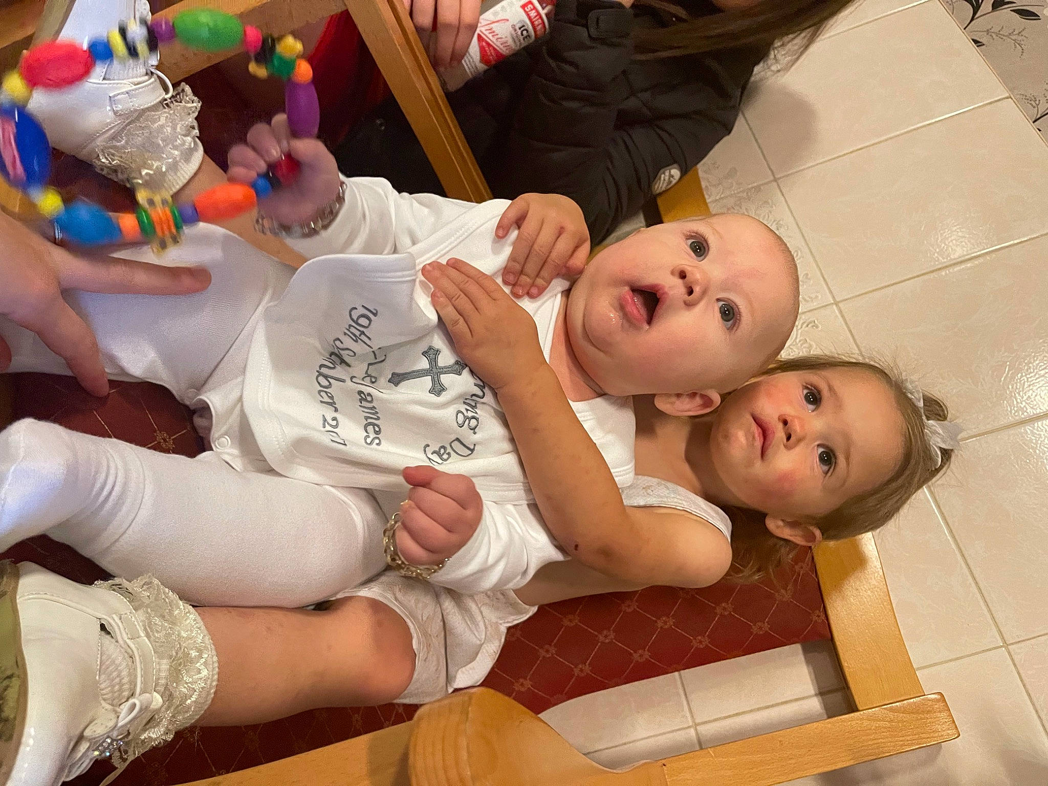 Riley-lee is registered to the contest to win money with this photo: abdomen, chest, child, event, finger, flooring, fun, hand, happy, human_leg, knee, mouth, nail, party_supply, person, plastic_bottle, room, smile, surprise, thigh