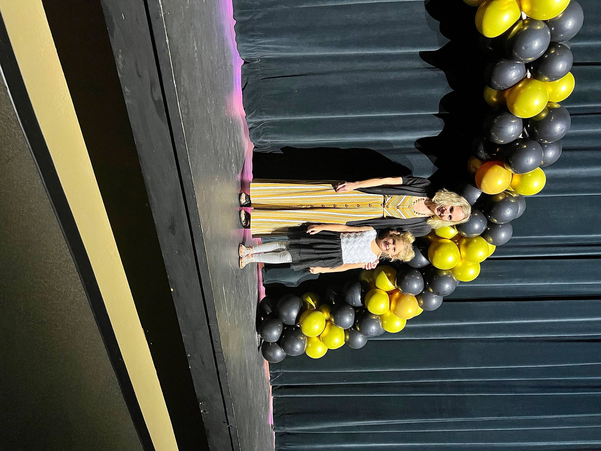 Maddilynn is registered to the contest to win money with this photo: architecture, balloon, design, fashion_accessory, flowering_plant, fruit, grapevine_family, house, joy, natural_foods, orange, person, plant, room, seedless_fruit, shadow, sports_equipment, still_life_photography, tints_and_shades, tree