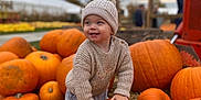 Tommy joined the competition — help win amazing prizes! child, toddler, pumpkin, autumn, outdoor, smiling, hat, knitwear, orange, fall, harvest, hay, happy, seasonal, cute, baby, nature, festive, playful, portrait