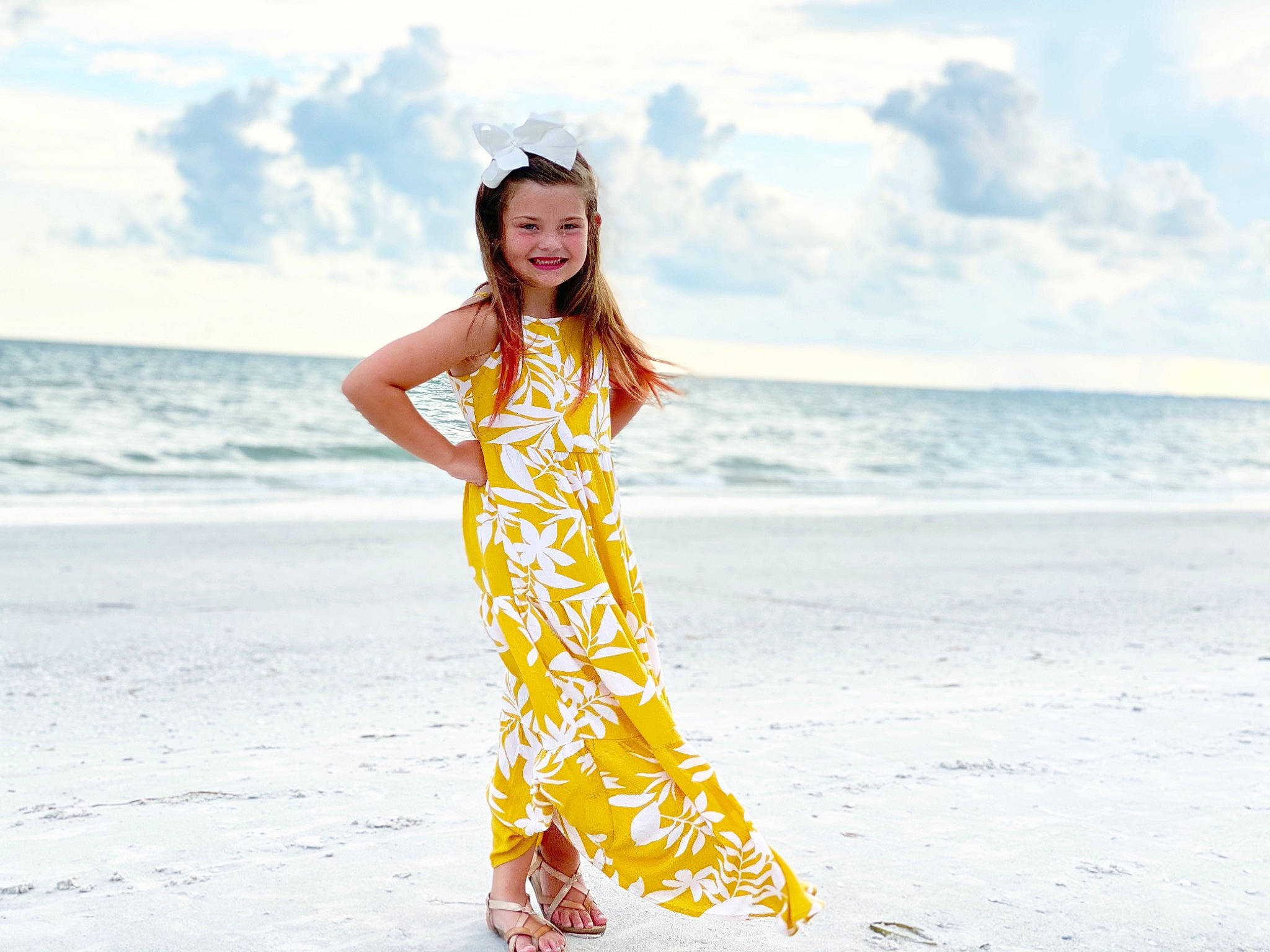 Adilyn is registered to the contest to win money with this photo: beach, cloud, day_dress, dress, face, fashion_design, flash_photography, fun, happy, horizon, joy, one_piece_garment, people_in_nature, people_on_beach, person, sky, sleeve, smile, street_fashion, travel
