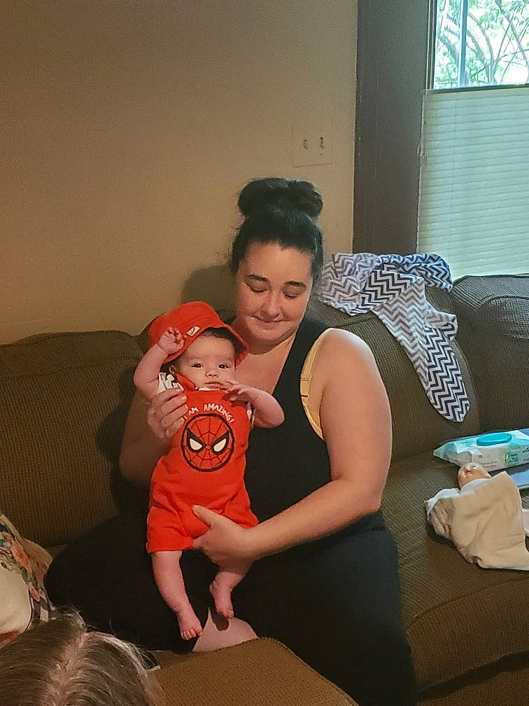 William is registered to the contest to win money with this photo: abdomen, baby, comfort, couch, event, finger, fun, happy, human_leg, joint, joy, mouth, muscle, person, shoulder, sitting, skin, smile, thigh, toddler