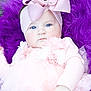 Violette is registered to the contest to win money with this photo: baby, infant, child, pink_clothing, headband, bow, fluffy_background, purple, soft_texture, tulle_skirt, flower_decorations, hand, face, blue_eyes, portrait, cute, cute_baby, outdoor, closeup, lying_down