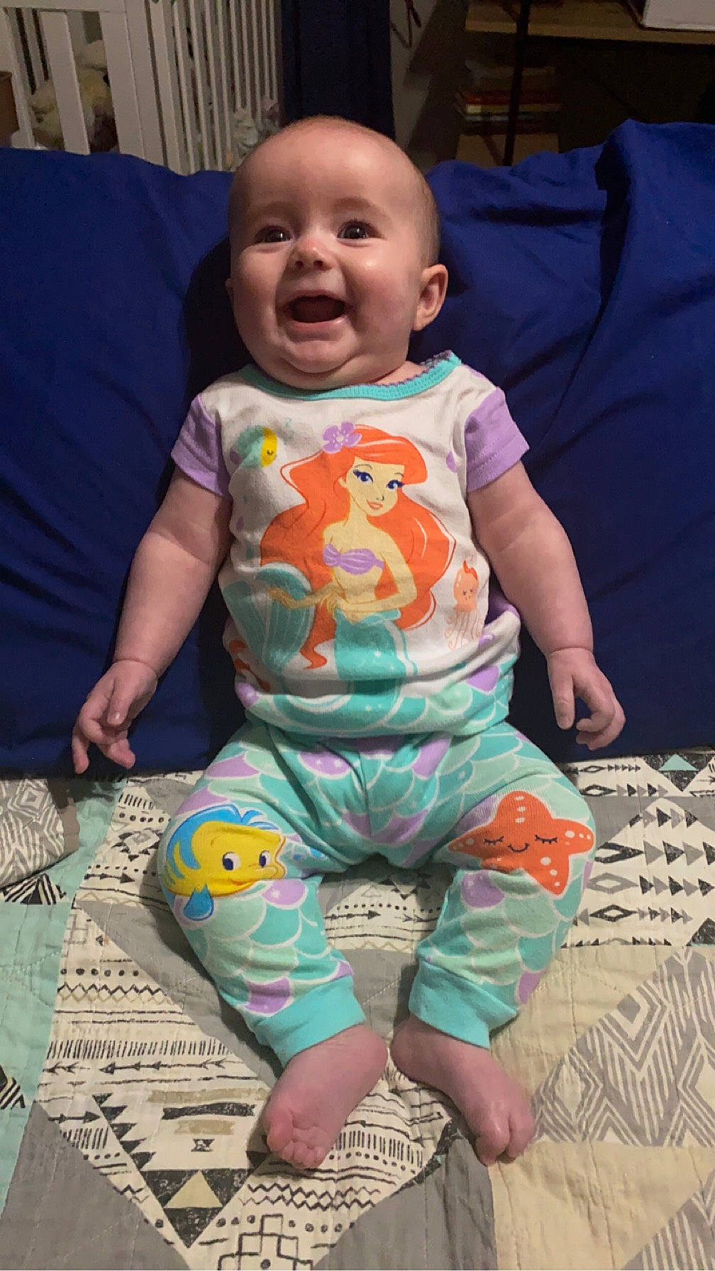 Maisie is registered to the contest to win money with this photo: baby, baby_toddler_clothing, cheek, child, comfort, cool, eye, face, facial_expression, green, hairstyle, happy, head, human, person, pink, skin, sleeve, smile, t_shirt