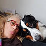 Rocket a rejoint le concours — aidez-le/la à gagner de superbes lots ! woman, dog, glasses, face, tongue_out, blond_hair, black_clothing, pet, indoor, resting, closeup, affection, cute, companion, animal, friendship, portrait, relaxing, hair, funny_face