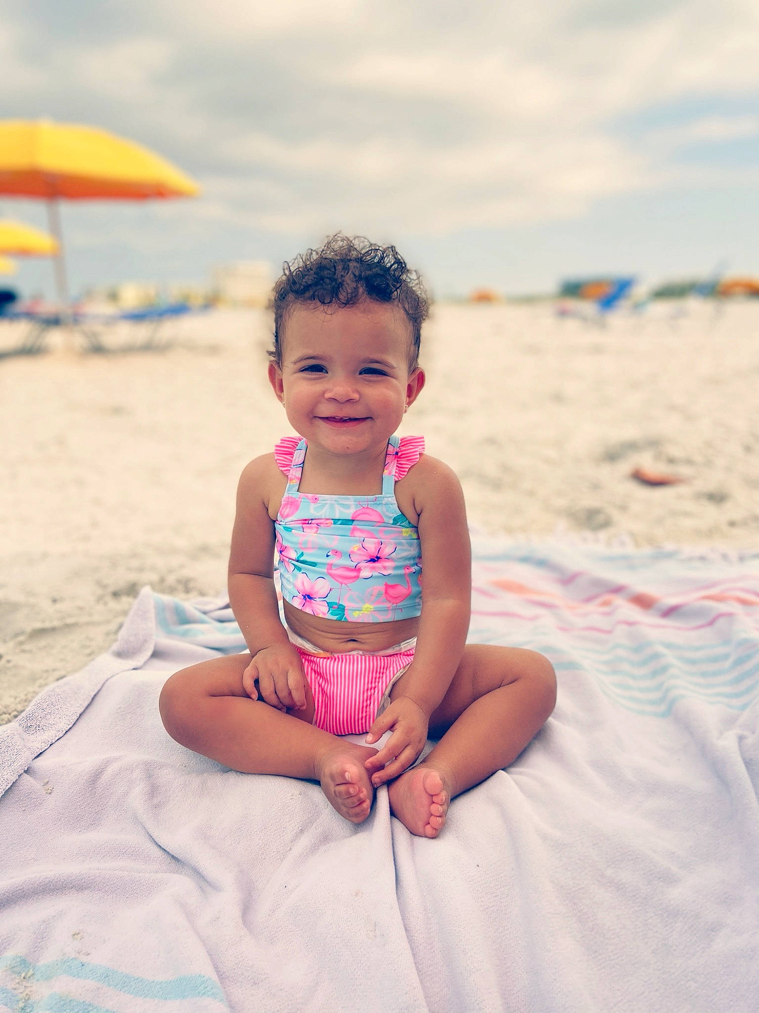 Kashton is registered to the contest to win money with this photo: baby, baby_toddler_clothing, beach, beauty, body_of_water, cloud, fun, happy, holiday, horizon, joy, landscape, leisure, people_in_nature, people_on_beach, person, sand, sky, smile, summer