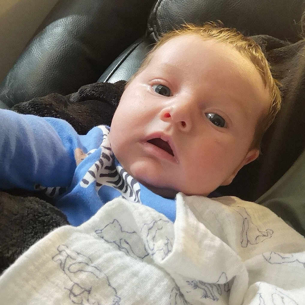 Quinn joined the competition — help win amazing prizes! baby, bed, blanket, clothing, couch, crib, cushion, face, furniture, head, homedecor, infantbed, linen, newborn, pants, person, photography, portrait, quilt, sleeping