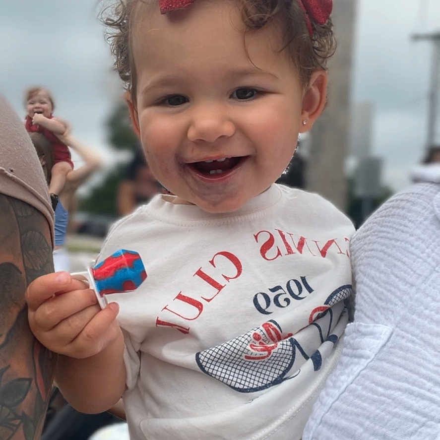 Leila joined the competition — help win amazing prizes! adult, baby, babylaughing, bodypart, clothing, face, finger, hand, happy, hat, head, male, man, person, photography, portrait, skin, smile, t_shirt, tattoo
