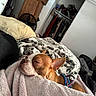 dog, sleeping, blanket, bedroom, cozy, fur, brown, white, pet, resting, comfort, indoor, pillow, fan, clothes, closet, furniture, relaxing, canine, harness