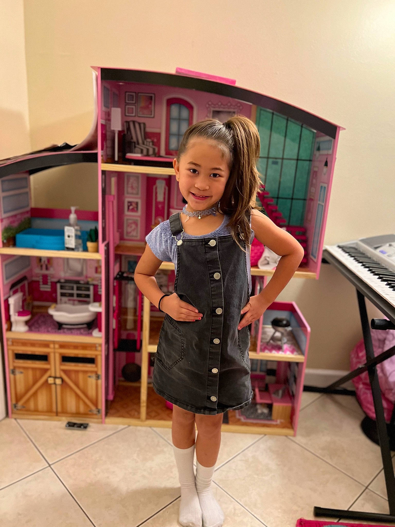 Lilyanna joined the competition — help win amazing prizes! boot, child, computer_keyboard, event, fashion_accessory, fashion_design, flooring, joy, luggage_and_bags, magenta, pattern, person, pink, room, shelf, shelving, sleeve, smile, t_shirt, toddler