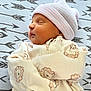 baby, newborn, sleeping, hat, onesie, lion_pattern, blanket, arrows, cozy, infant, peaceful, cute, face, child, portrait, soft, resting, clothing, sleep, toddler