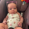 baby, infant, car_seat, graco, pink_sunglasses, onesie, ice_cream_pattern, cupcake_pattern, child, cute, seatbelt, sitting, indoor, person, portrait, young_child, baby_clothing, toy, colorful, comfortable