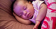 Seylah is registered to the contest to win money with this photo: baby, sleeping, infant, blanket, pillow, cozy, peaceful, child, face, hand, soft, indoors, cute, relaxation, rest, newborn, portrait, comfort, pink, clothing