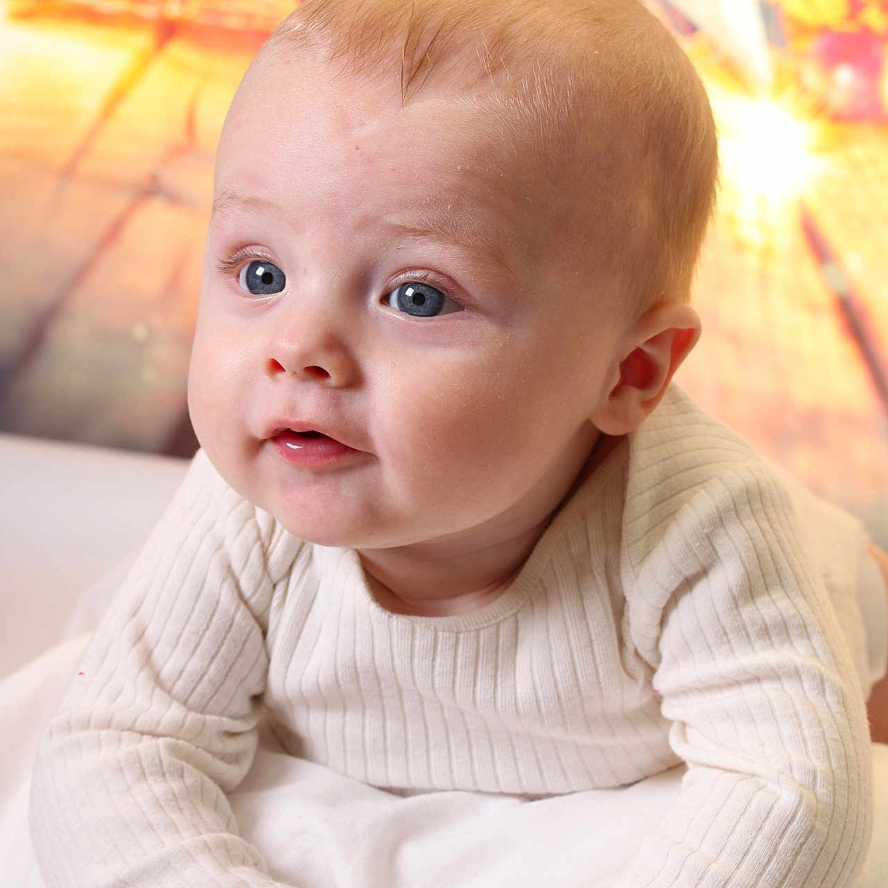 Noah joined the competition — help win amazing prizes! baby, blonde, bodypart, clothing, face, finger, frown, hair, hand, happy, head, knitwear, newborn, person, photography, portrait, sad, sitting, smile, sweater