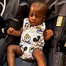 Christopher is registered to the contest to win money with this photo: baby, baby_boy, canopy, car_seat, casual, child, clothing, cute, donald_duck, fabric, indoors, infant, looking_away, mickey_mouse, onesie, person, portrait, seat, seat_belt, young_child