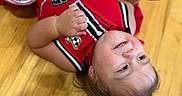 Delilah joined the competition — help win amazing prizes! toddler, child, smiling, red_bow, cheerleading_outfit, wooden_floor, badge, happy, girl, indoor, cute, portrait, person, cheerleader, clothing, baby, fun, young_child, cheer, sport