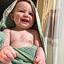 Westyn is registered to the contest to win money with this photo: baby, towel, smile, child, hood, bathroom, curtain, happy, infant, skin, person, cute, hand, face, tooth, indoor, plush, wrapped, young, joy