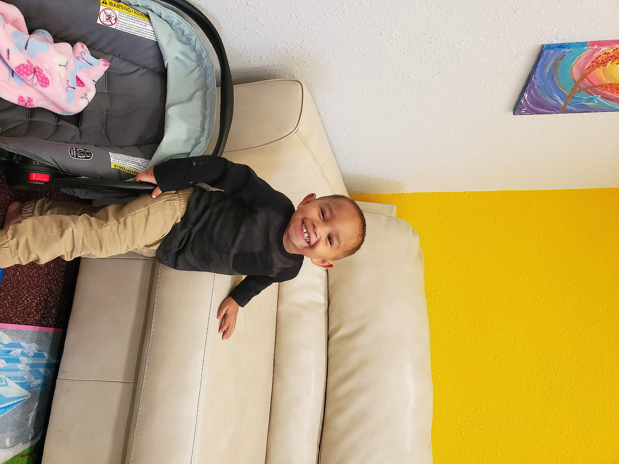 Trayvon joined the competition — help win amazing prizes! automotive_design, baby_products, backpack, bag, baggage, car_seat, child, comfort, fun, joy, luggage_and_bags, luxury_vehicle, person, personal_protective_equipment, picture_frame, recreation, room, t_shirt, toddler, travel