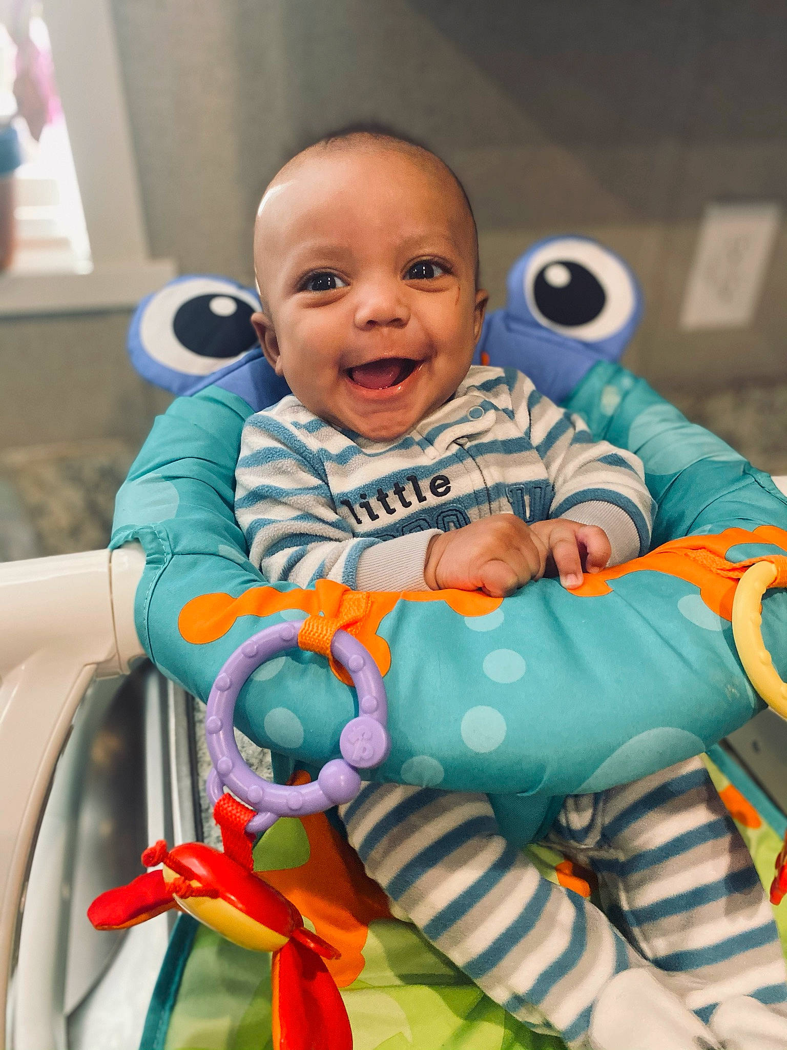 Keagan joined the competition — help win amazing prizes! baby, baby_playing_with_toys, baby_products, baby_safety, baby_toddler_clothing, baby_toys, cheek, child, comfort, eye, face, facial_expression, fun, happy, leisure, organ, person, sitting, skin, smile