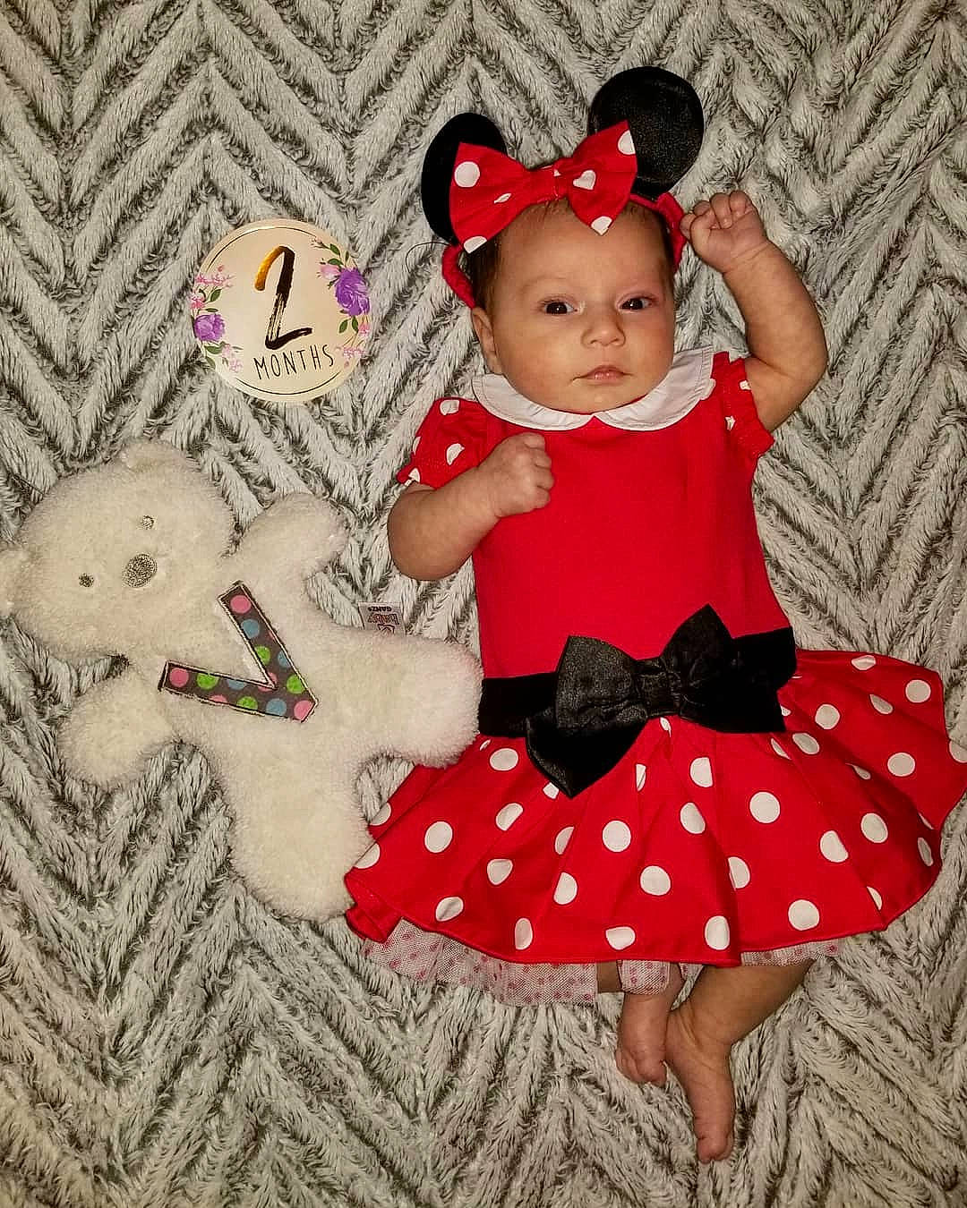 Vivienne is registered to the contest to win money with this photo: baby, baby_products, baby_toddler_clothing, baby_toys, child, costume, design, pattern, person, pink, polka_dot, product, red, stuffed_toy, teddy_bear, toddler, toy
