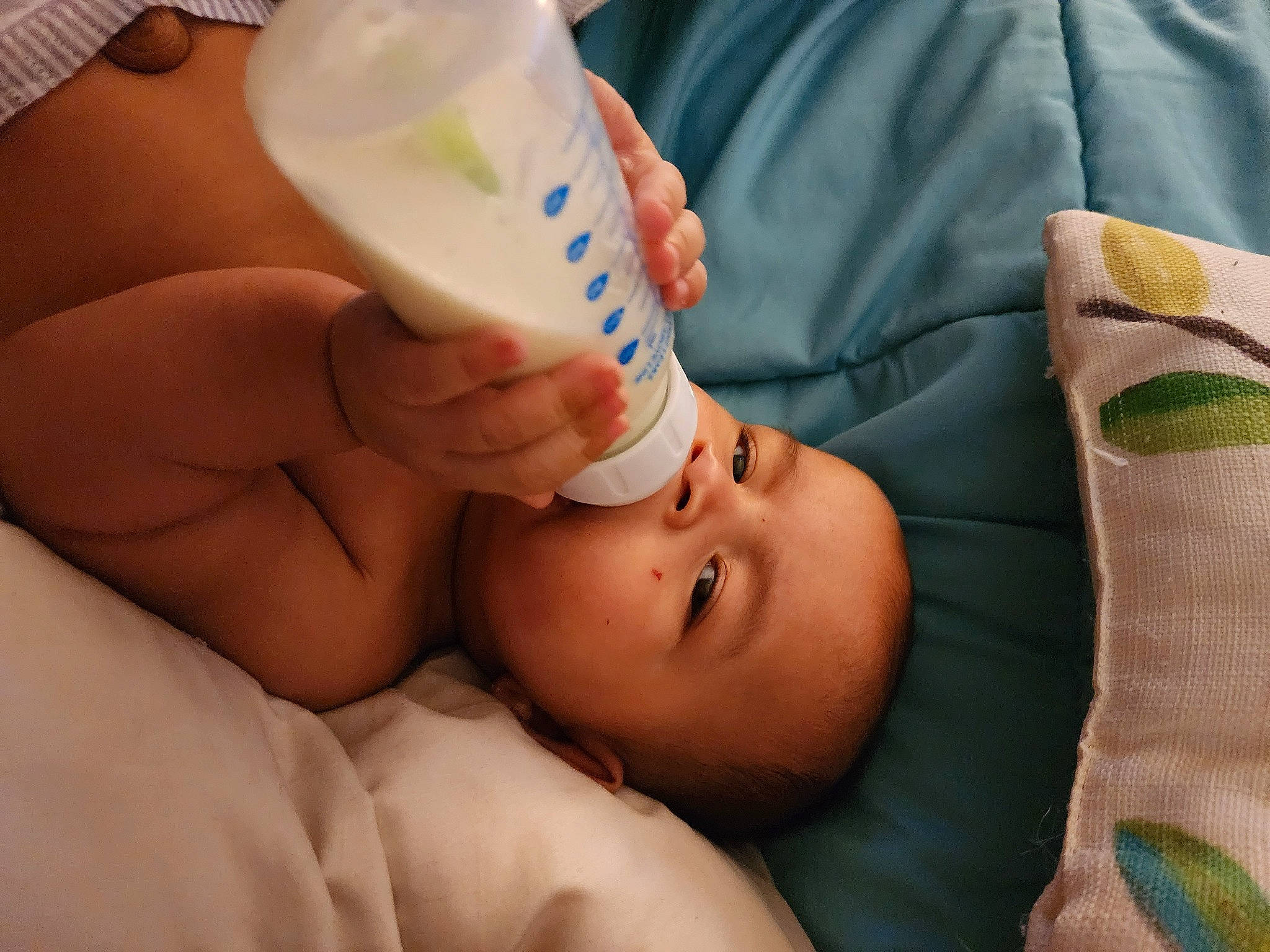 Dallas joined the competition — help win amazing prizes! baby, baby_bottle, baby_products, baby_toddler_clothing, child, comfort, dairy, drink, drinkware, finger, hand, health_care, human_leg, milk, nail, person, plant_milk, plastic_bottle, product, skin