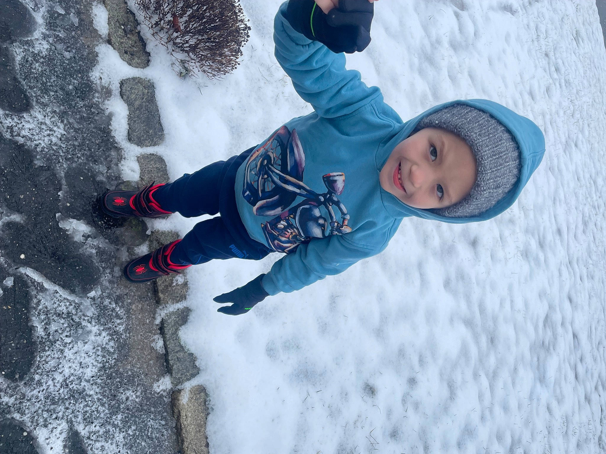 Zachary is registered to the contest to win money with this photo: baby_toddler_clothing, child, electric_blue, freezing, fun, geological_phenomenon, glove, happy, headwear, jacket, joy, leisure, outdoor_recreation, person, play, precipitation, recreation, slope, snow, toddler