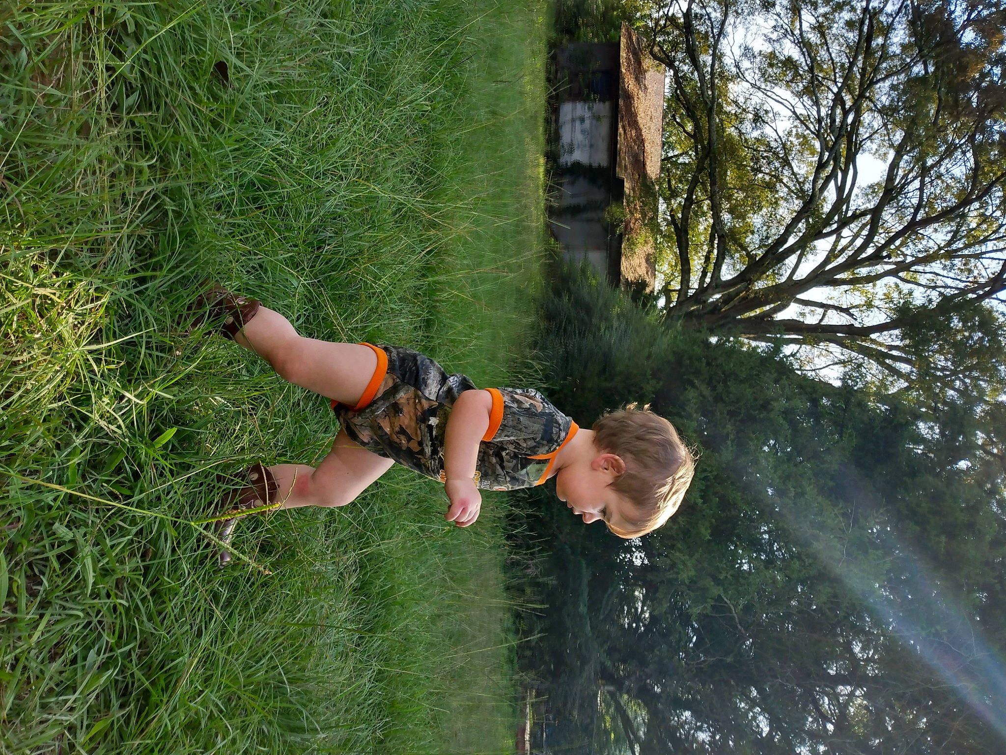 River joined the competition — help win amazing prizes! adventure, fun, grass, grassland, happy, landscape, leisure, people_in_nature, person, plant, recreation, reflection, shrub, soil, toddler, tree