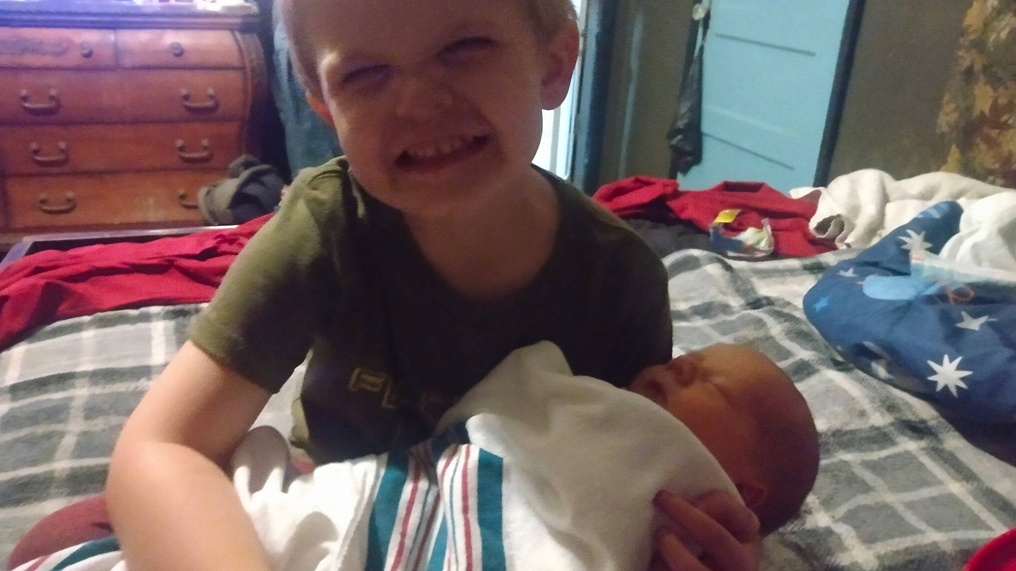 Cam is registered to the contest to win money with this photo: abdomen, baby, baby_toddler_clothing, cabinetry, cheek, chest, child, comfort, elbow, eye, gesture, hand, happy, head, joint, joy, nose, person, skin, smile