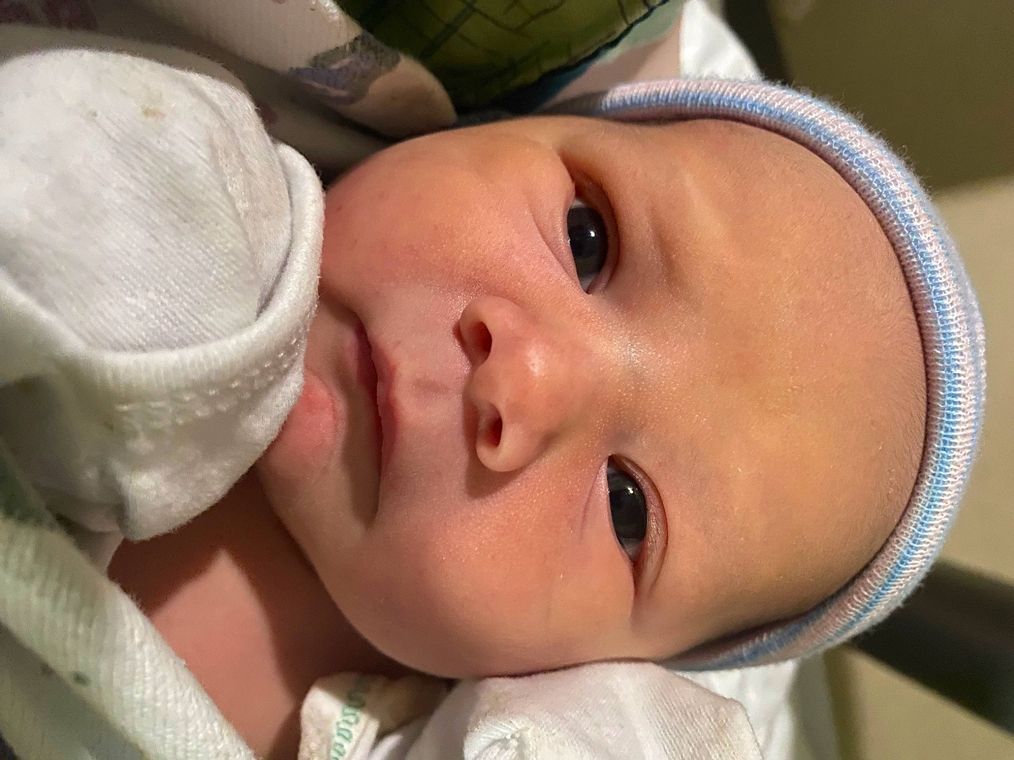 Aiden joined the competition — help win amazing prizes! baby, baby_products, baby_toddler_clothing, cap, cheek, child, comfort, eyebrow, eyelash, forehead, hand, happy, hat, headgear, lip, mouth, nose, person, skin, smile