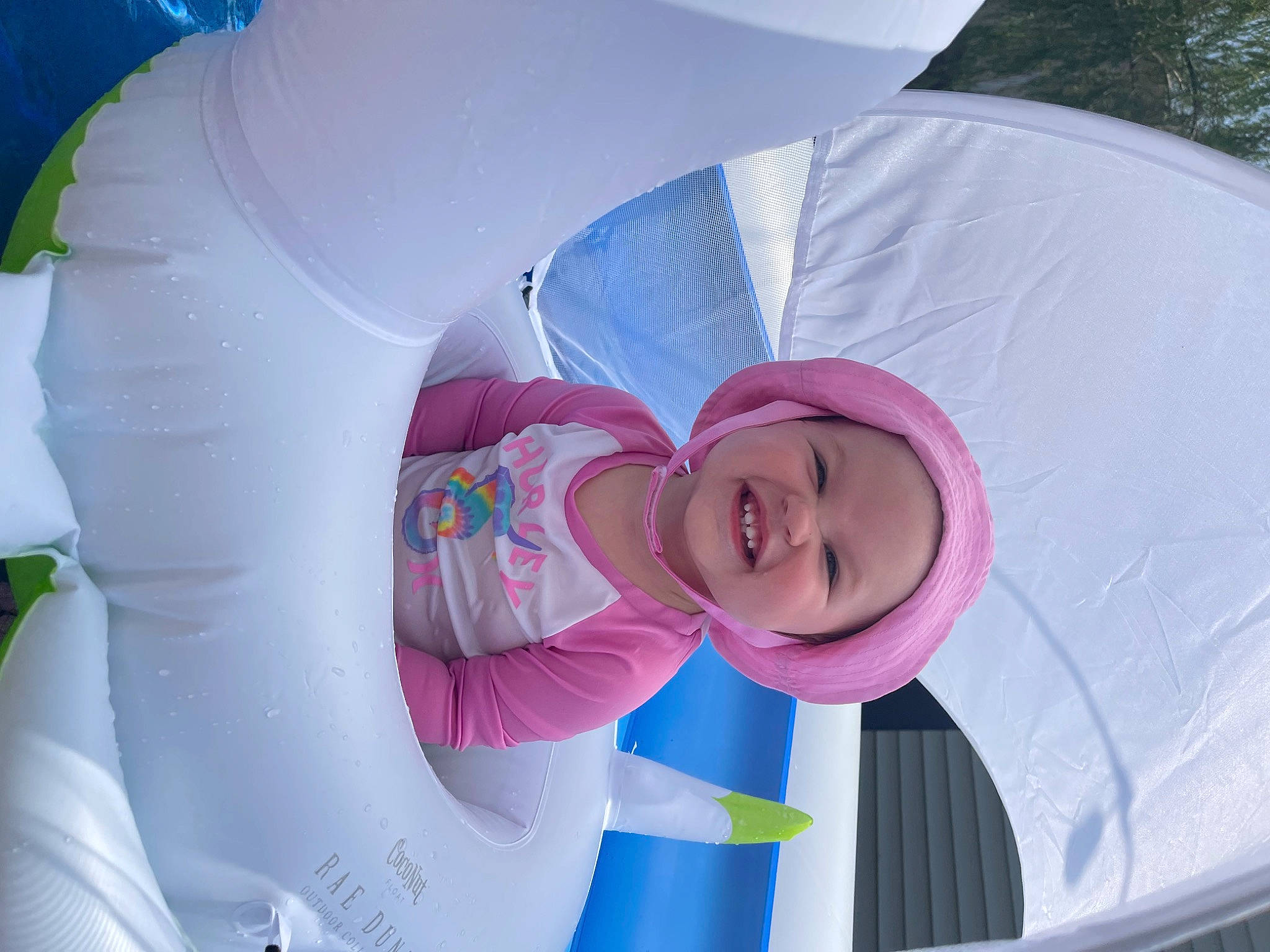 Storie joined the competition — help win amazing prizes! baby, cap, child, fashion_accessory, fun, grass, happy, hat, headgear, headwear, joy, leisure, magenta, person, pink, purple, recreation, smile, sun_hat, toddler