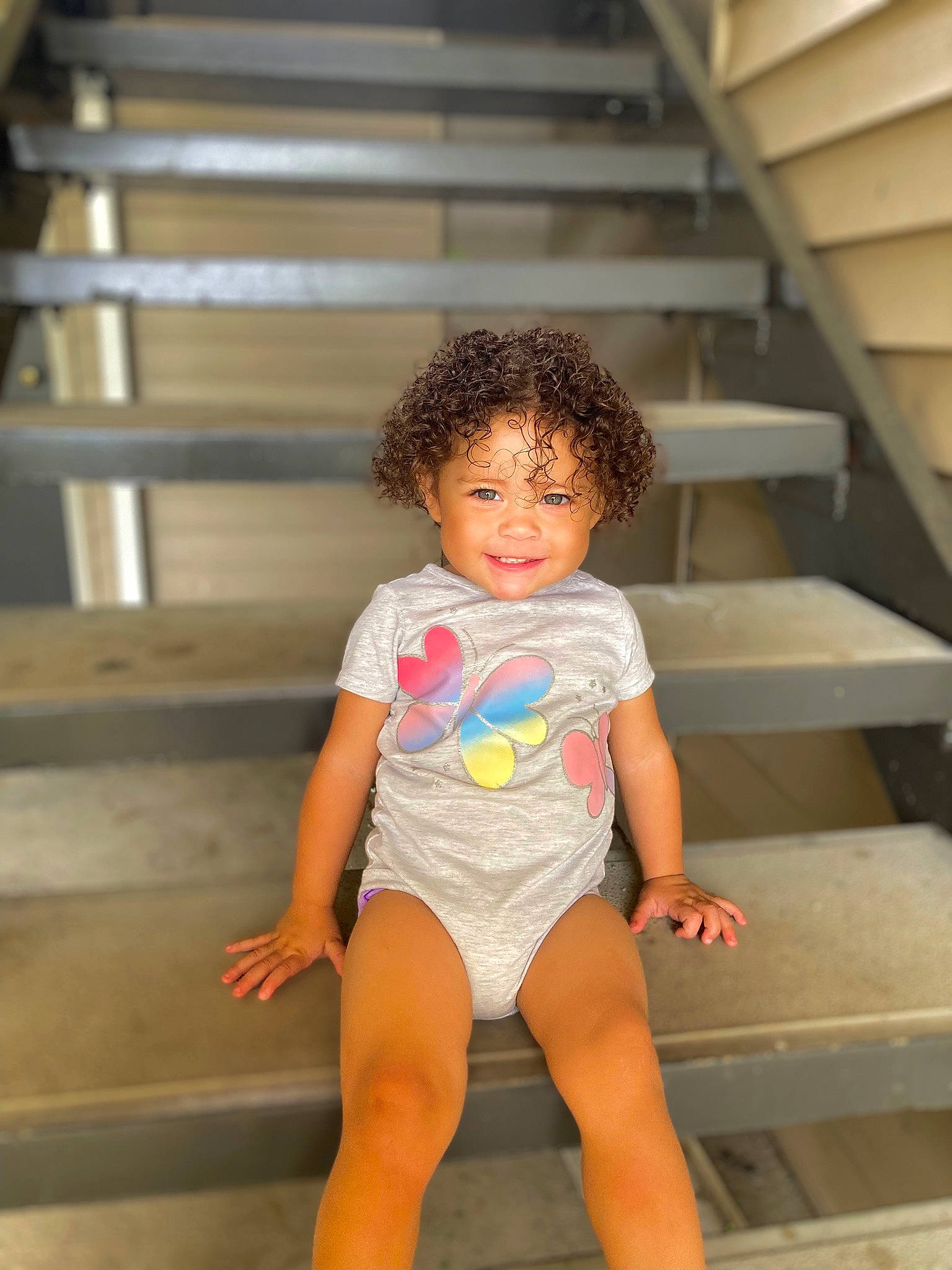 Zarra joined the competition — help win amazing prizes! baby_toddler_clothing, eye, flash_photography, foot, fun, happy, head, human_body, human_leg, knee, leg, leisure, person, sitting, skin, sleeve, smile, t_shirt, thigh, toddler