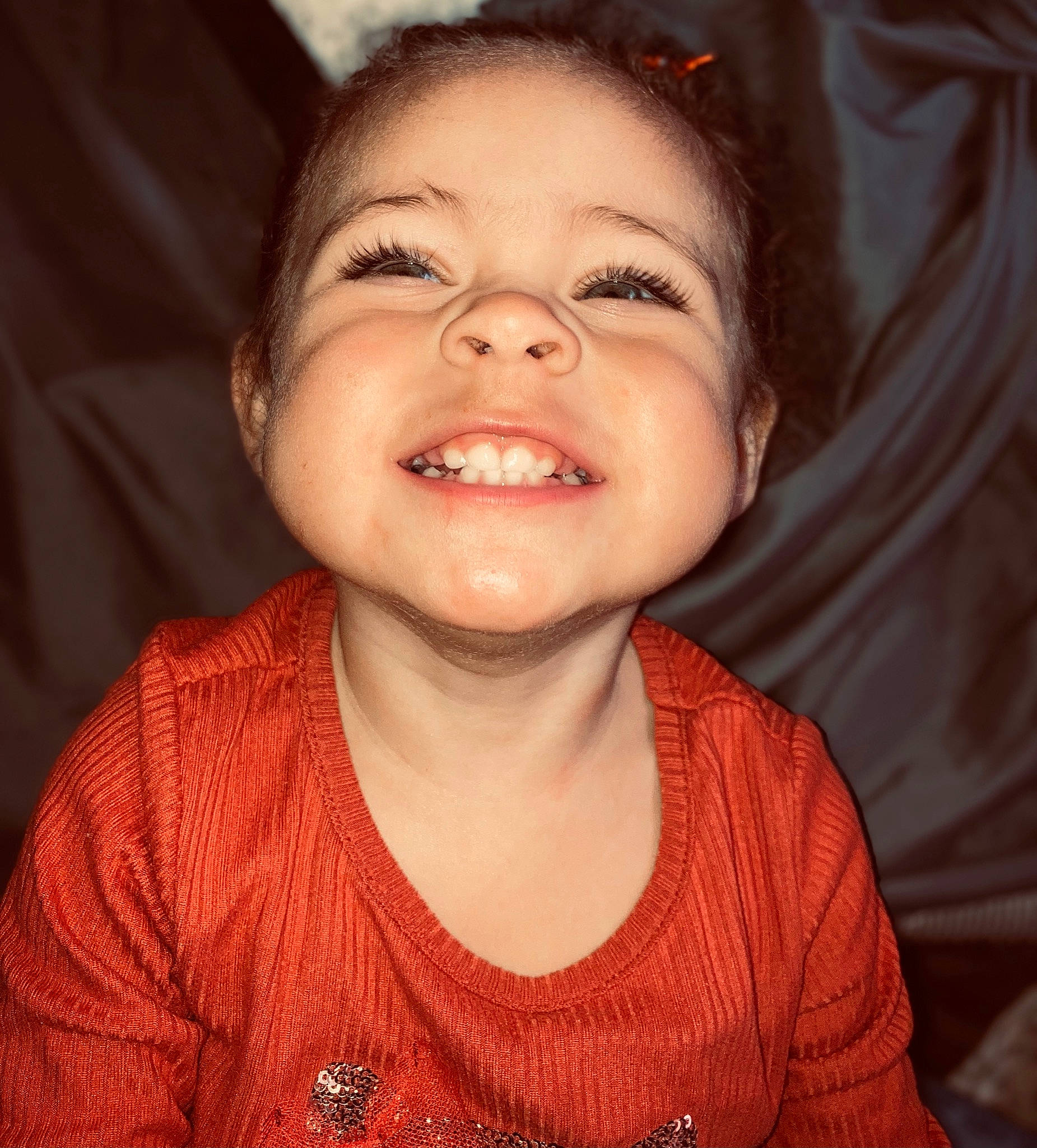 Zarra is registered to the contest to win money with this photo: baby_toddler_clothing, cheek, clothing, ear, eyelash, flash_photography, forehead, happy, human_body, iris, jaw, joy, lip, mouth, nose, organ, person, sleeve, smile, t_shirt