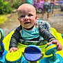 Owen joined the competition — help win amazing prizes! baby, child, smiling, activity_walker, toys, outdoor, play, summer, happy, infant, colorful, blurred_background, person, water, fun, cute, young_child, sunlight, garden, playtime