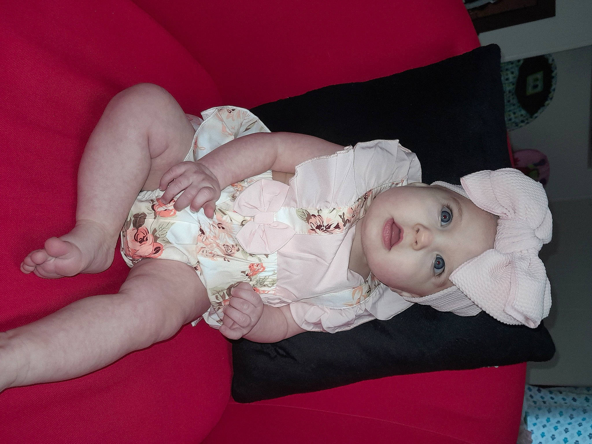 Lollie joined the competition — help win amazing prizes! arm, baby, baby_products, baby_toddler_clothing, child, comfort, dress, eye, fashion_accessory, flash_photography, hair_accessory, hand, headgear, headpiece, headwear, human_body, human_leg, pattern, person, pink