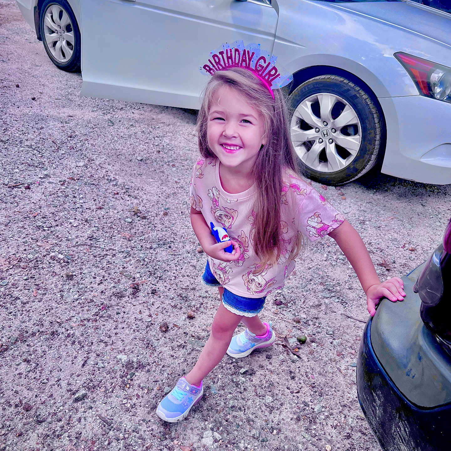 Gracie joined the competition — help win amazing prizes! alloywheel, car, carwheel, child, clothing, dress, face, female, girl, head, machine, person, photography, portrait, purple, spoke, tire, transportation, vehicle, wheel