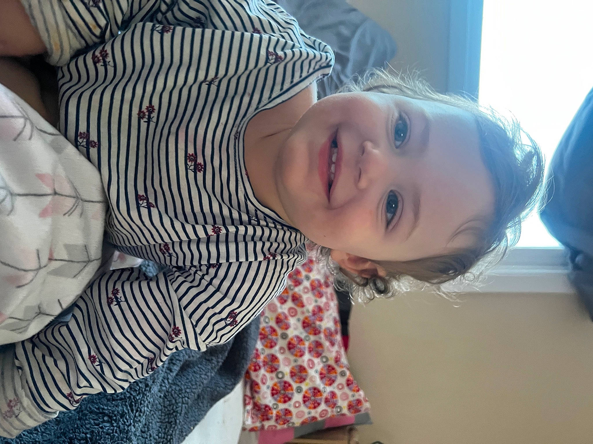 Serein is registered to the contest to win money with this photo: baby, ball, child, comfort, flooring, football, fun, happy, human_body, joy, laugh, mouth, nose, pattern, person, plaid, sitting, skin, smile, soccer